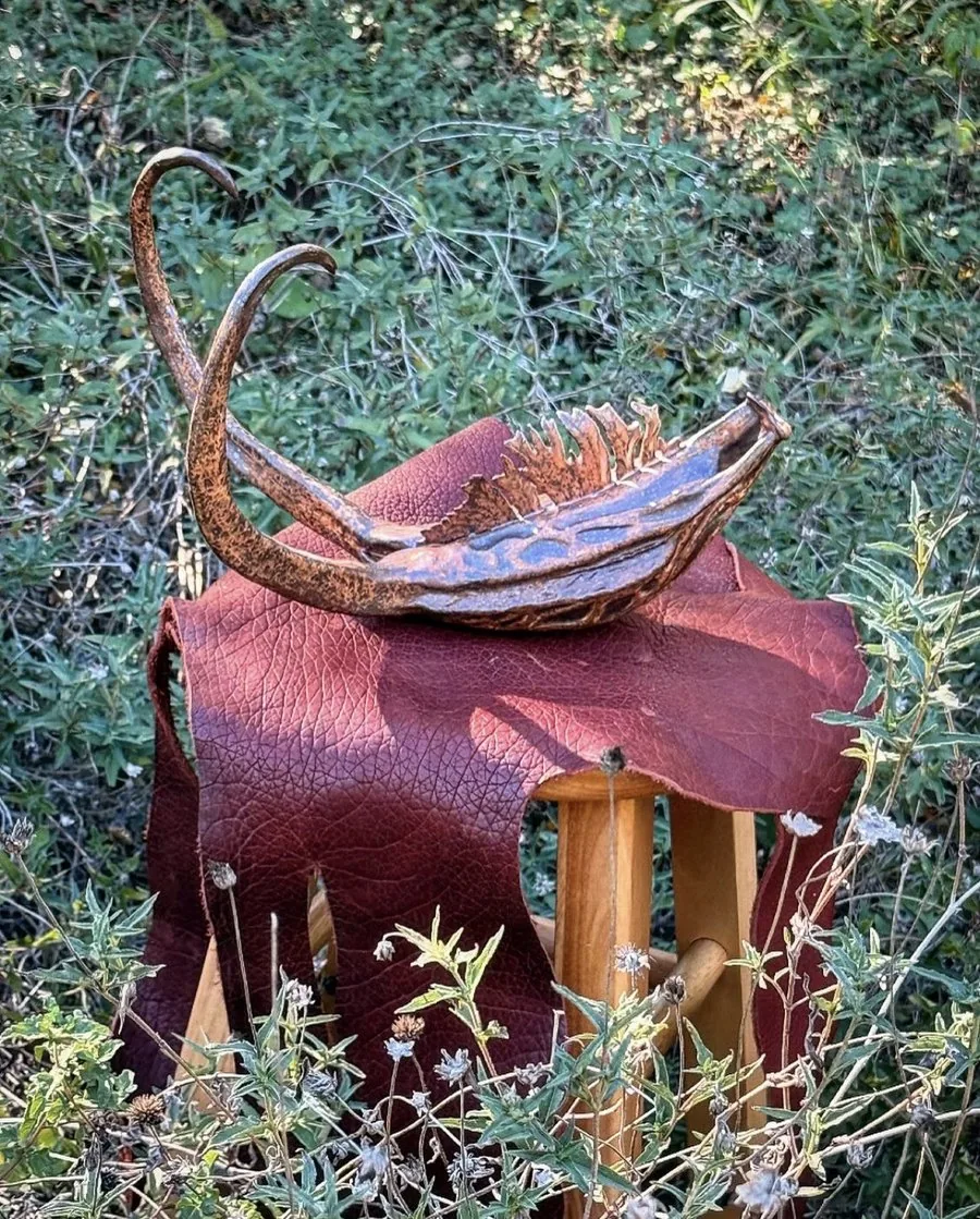 Ceramic sculpture with leather